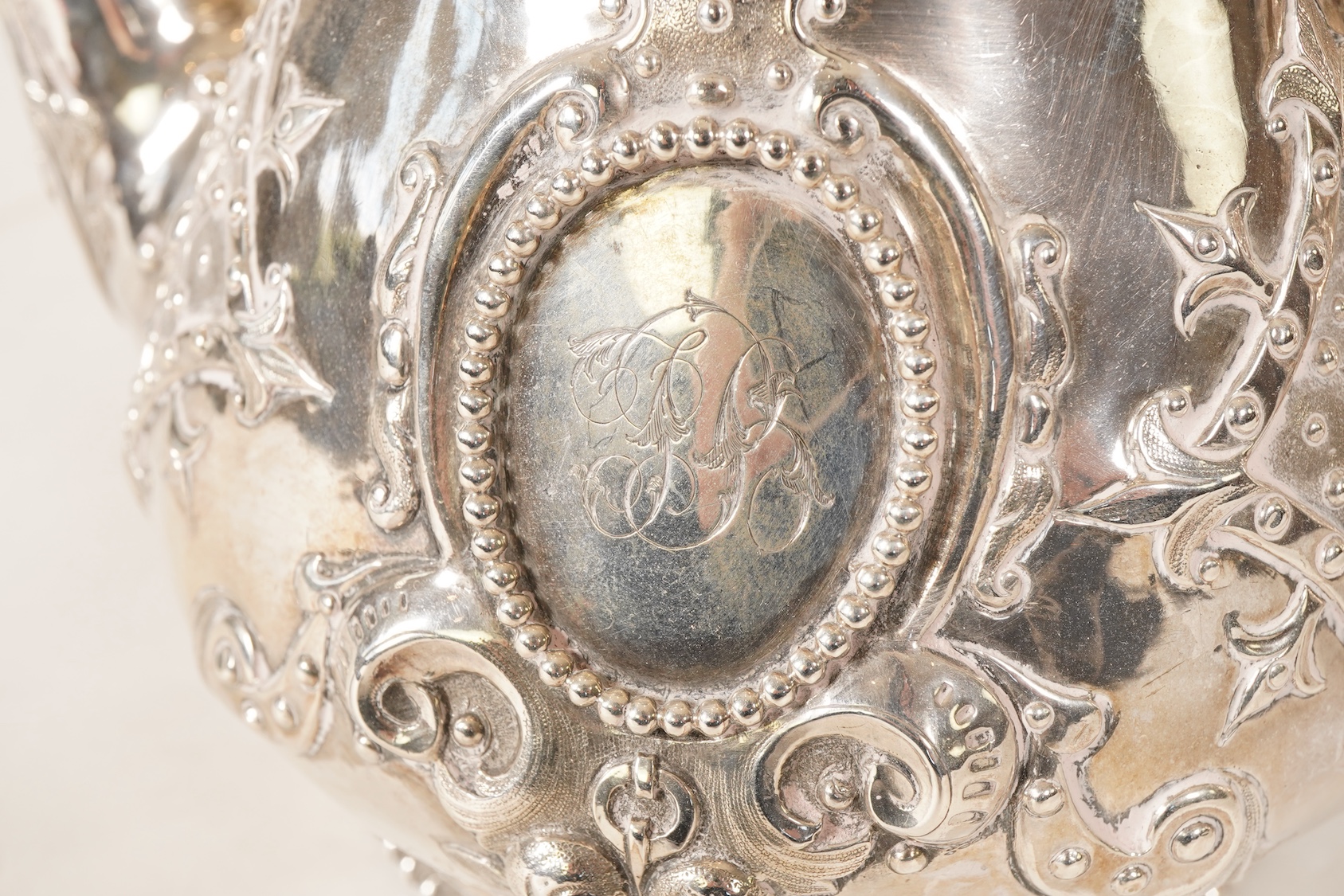 A Victorian ornate silver four piece tea and coffee service, by Thomas Smily